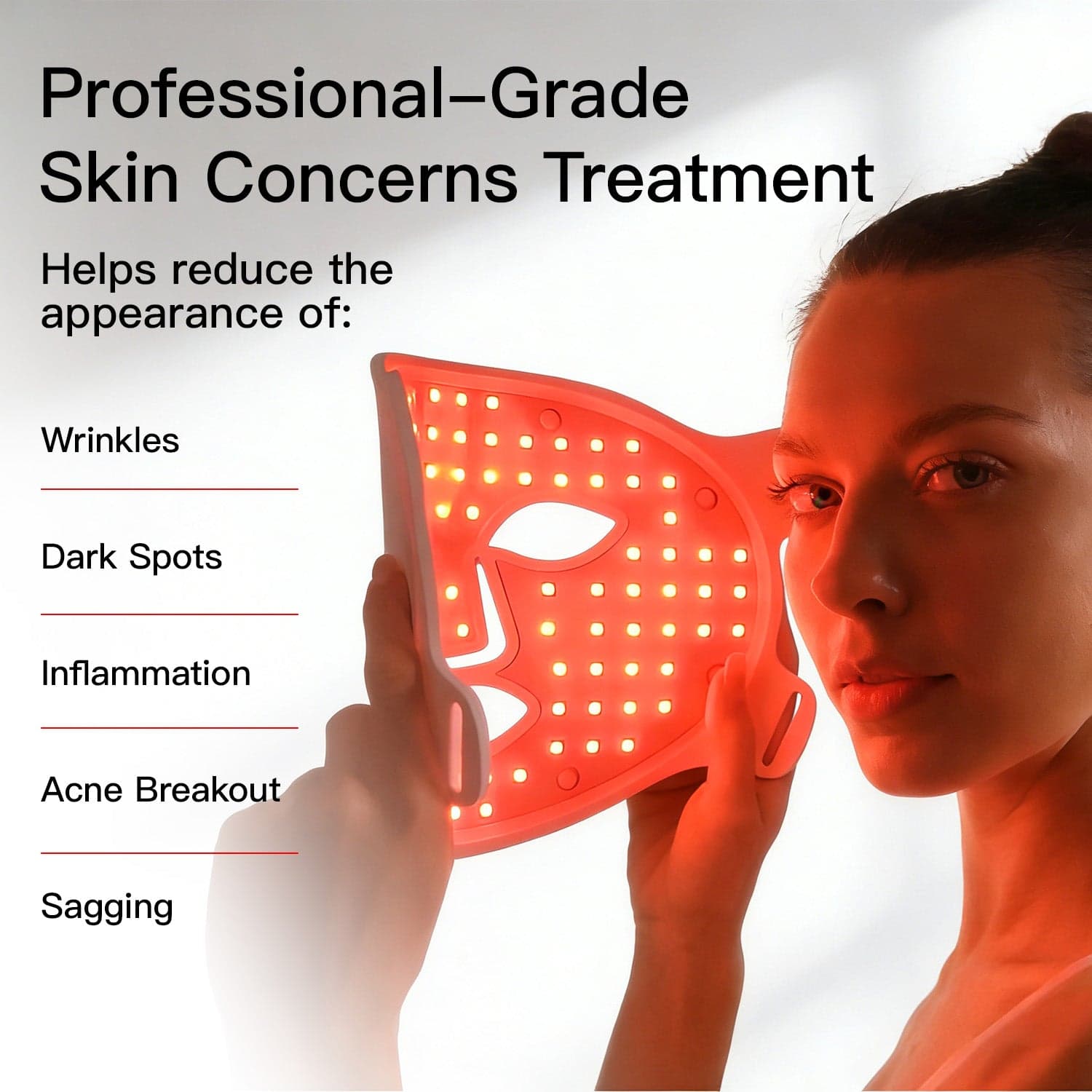 Person holding the illuminated MEGELIN JML1 face mask beside their face.
