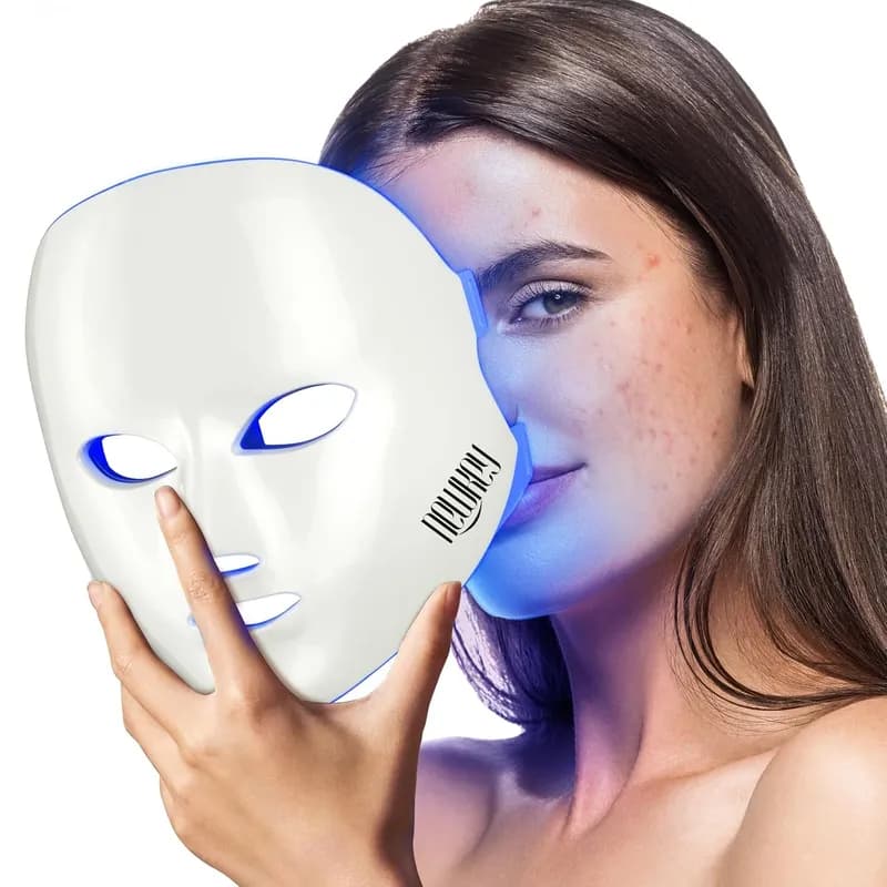 NEWKEY 4D LED mask in blue-light mode held next to a model's face